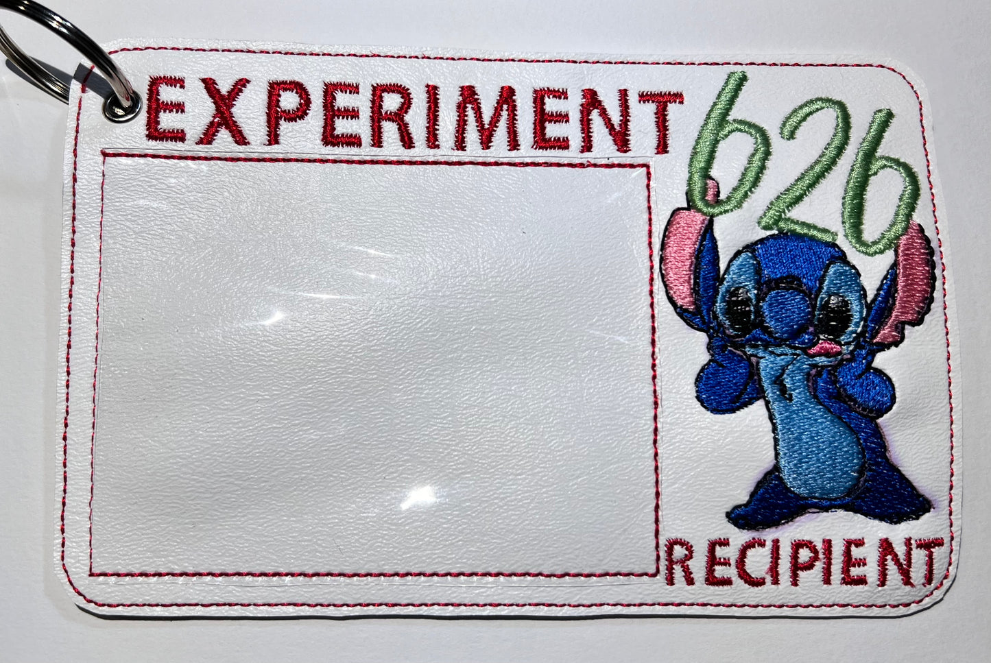 Blue alien vaccination holder